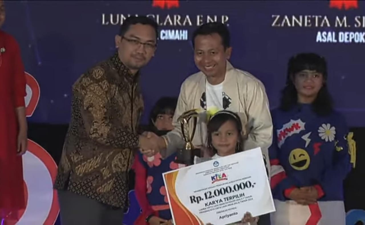 Guru SMK Negeri 1 Adiwerna Kabupaten Tegal Juara Lagu Anak  Nasional