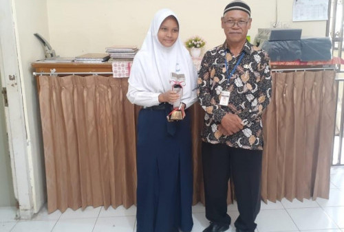 Keren, Siswa SMPN 17 Kota Tegal Naswah Dina Aulia Raih Juara Terbaik Dua MTQ Jateng