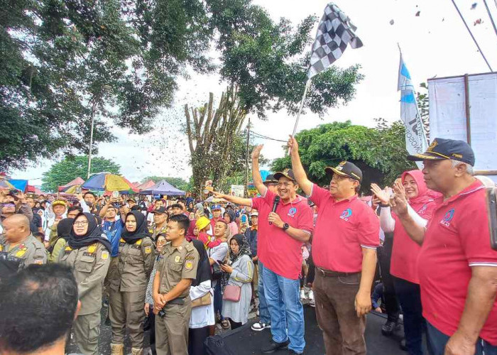 HUT ke 49 PDAM Tirta Aji, Ribuan Warga Wonosobo Ikuti Jalan Sehat Berhadiah Umroh